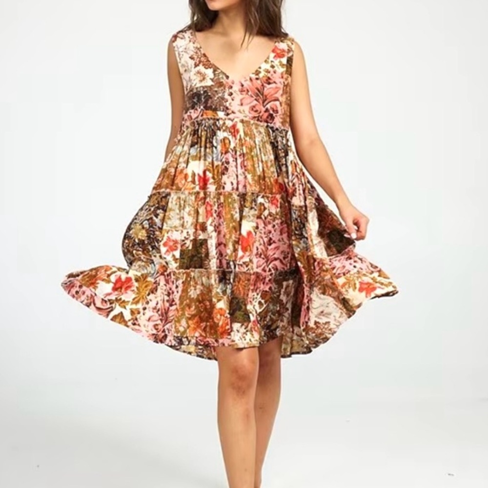 Talisman Lucky Charm Enchanted Patchwork Print V-Neck
Tiered Swing Dress